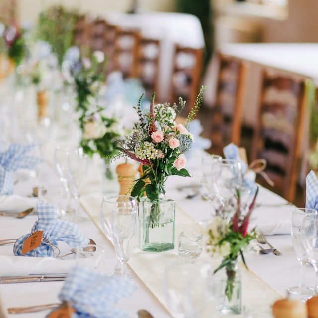 Elegant reception tablescape with seasonal florals