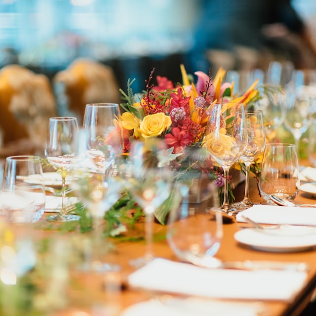 Vibrant floral centerpiece on a candlelit table